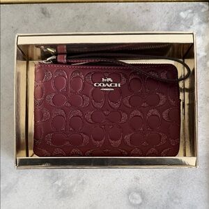 Coach Maroon Embossed Wristlet New in Box